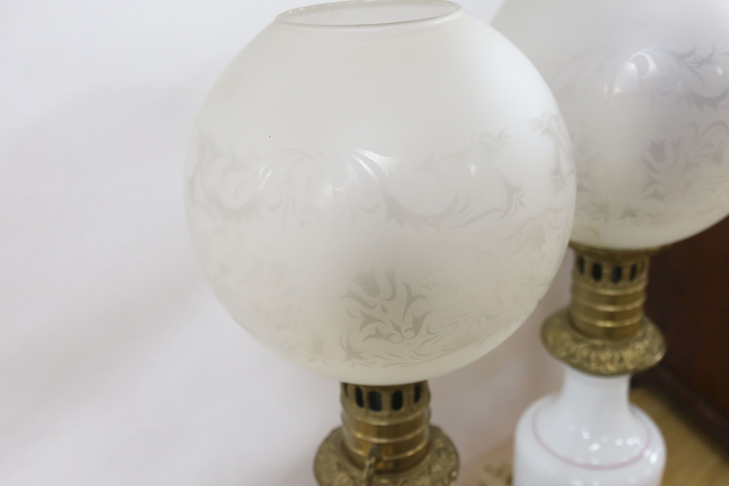 A pair of Napoleon III porcelain converted oil lamps. 59cm